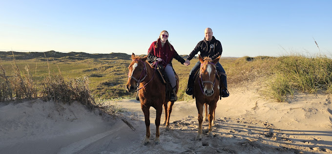 Rider on a beach horseback ride at sunset, horseback riding on the beach south padre island